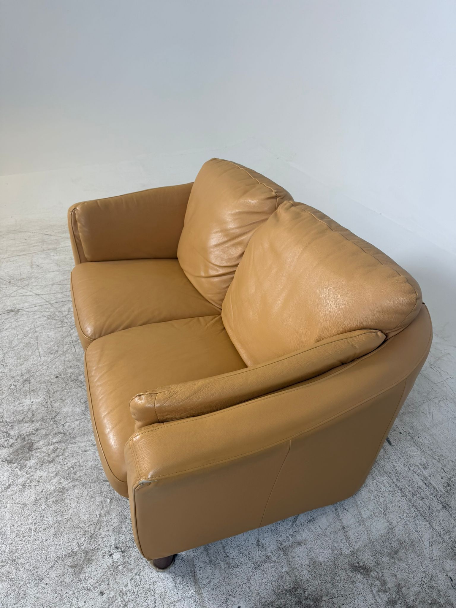 MCM Leather Loveseat. Caramel 2 seater sofa couch. Delivery available