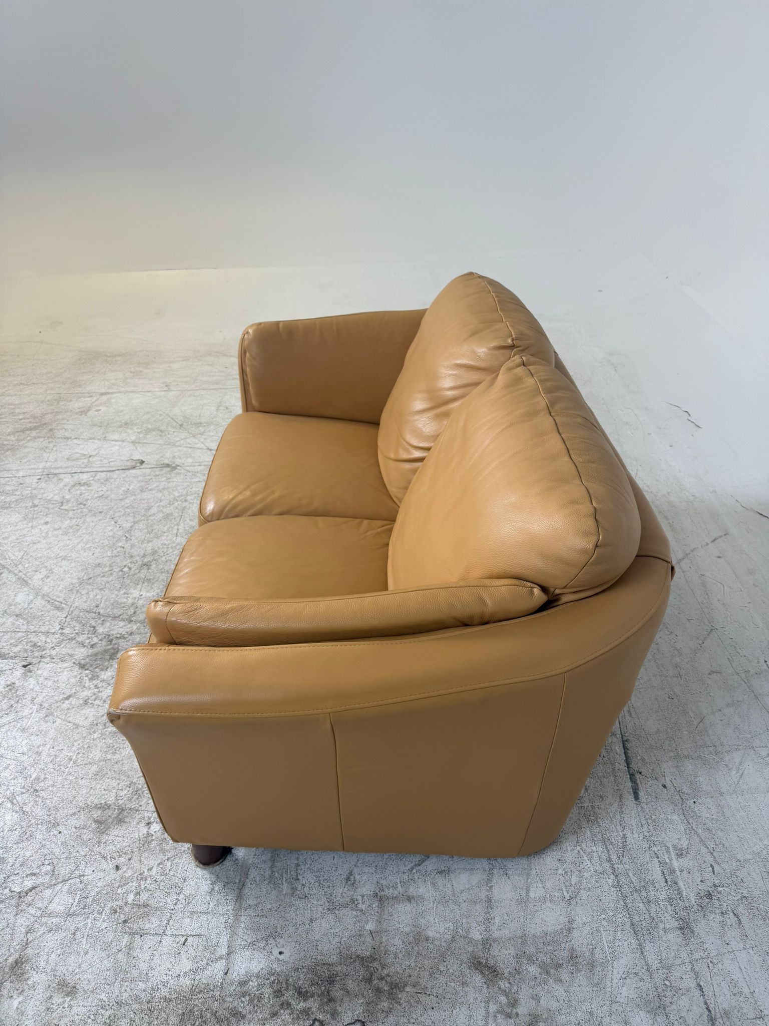 MCM Leather Loveseat. Caramel 2 seater sofa couch. Delivery available