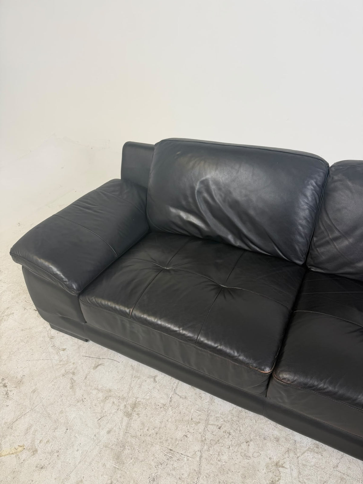 Urban Barn Leather Sectional. Black L shaped sofa couch. Delivery available