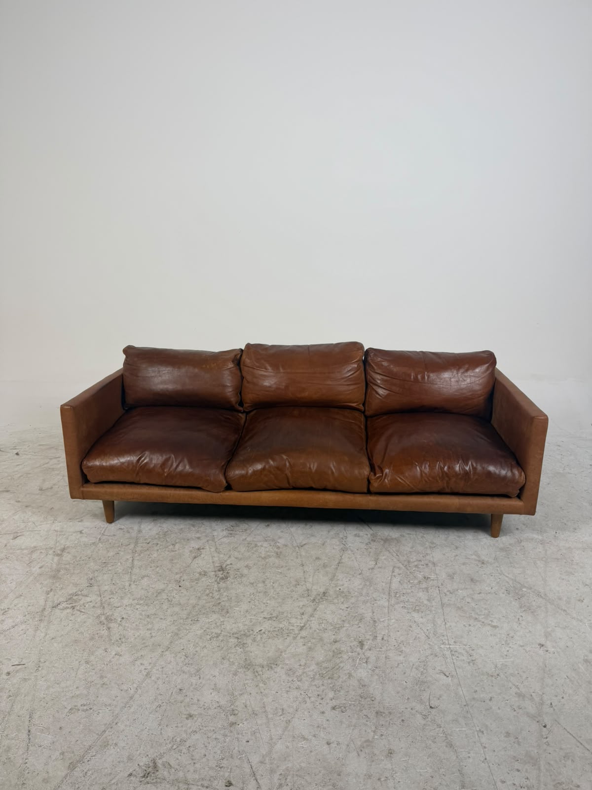 Article Nirvana Sofa. Distressed leather 3 seater couch. Delivery available
