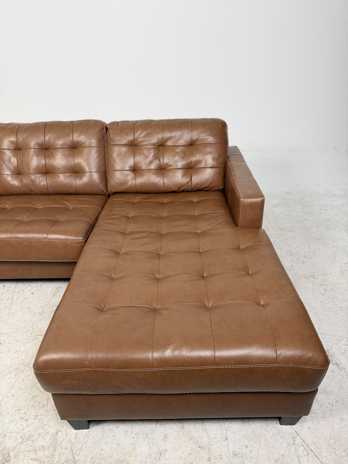 Ashley's Furniture Leather Sectional. Cognac L shaped sofa couch. Delivery available
