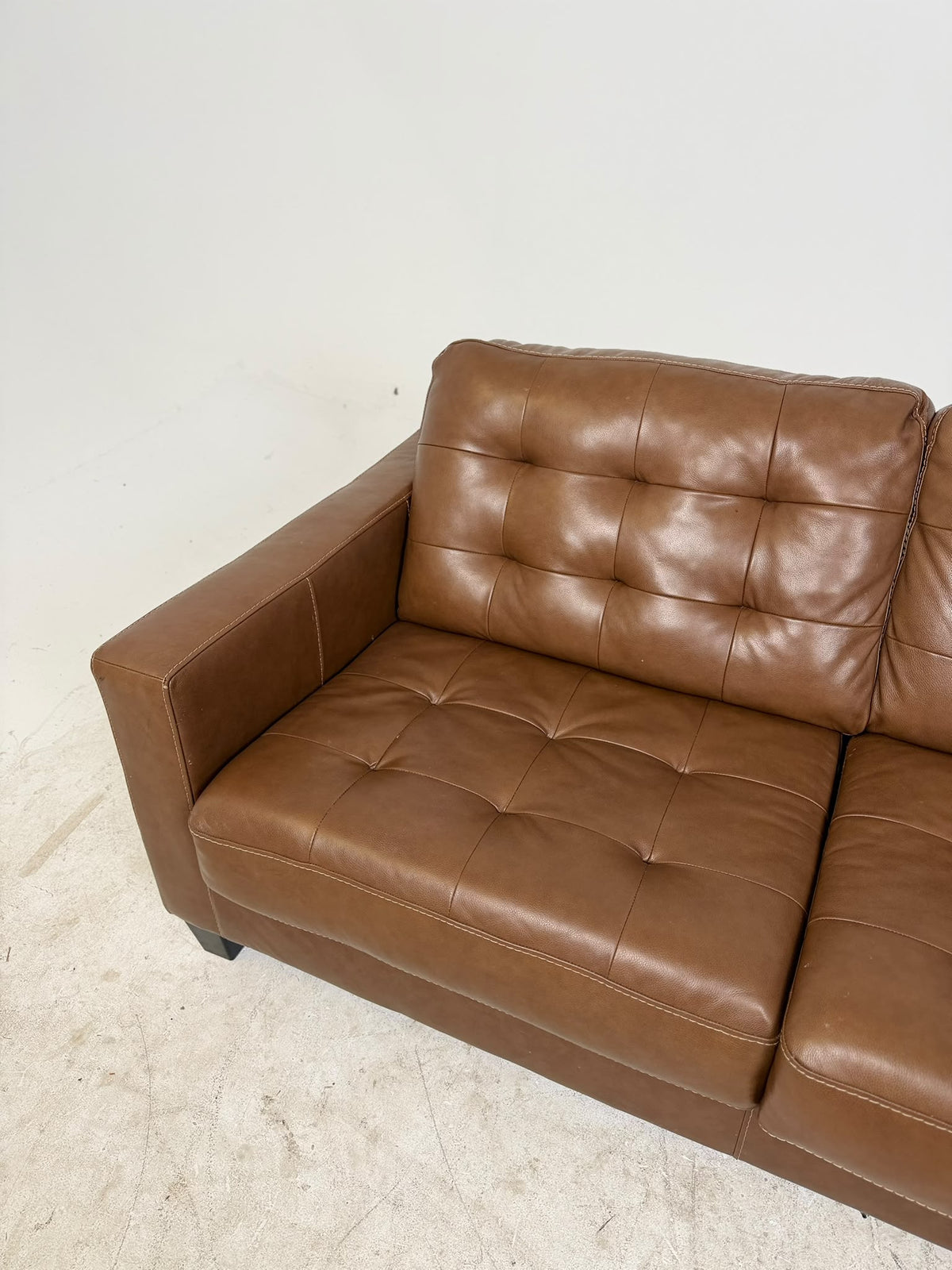 Ashley's Furniture Leather Sectional. Cognac L shaped sofa couch. Delivery available