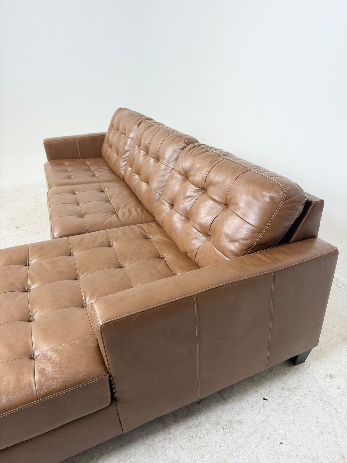 Ashley's Furniture Leather Sectional. Cognac L shaped sofa couch. Delivery available