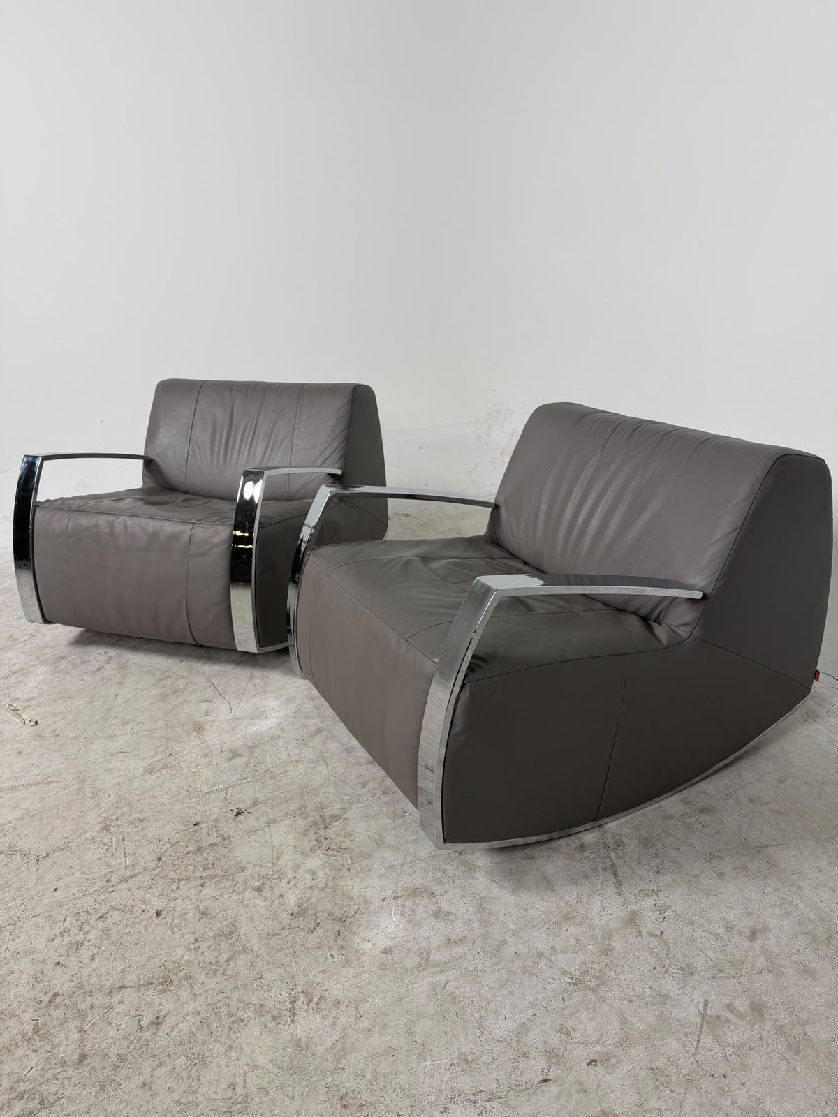 EQ3 Pair of matching chairs. Rocking leather Chairs. Delivery available