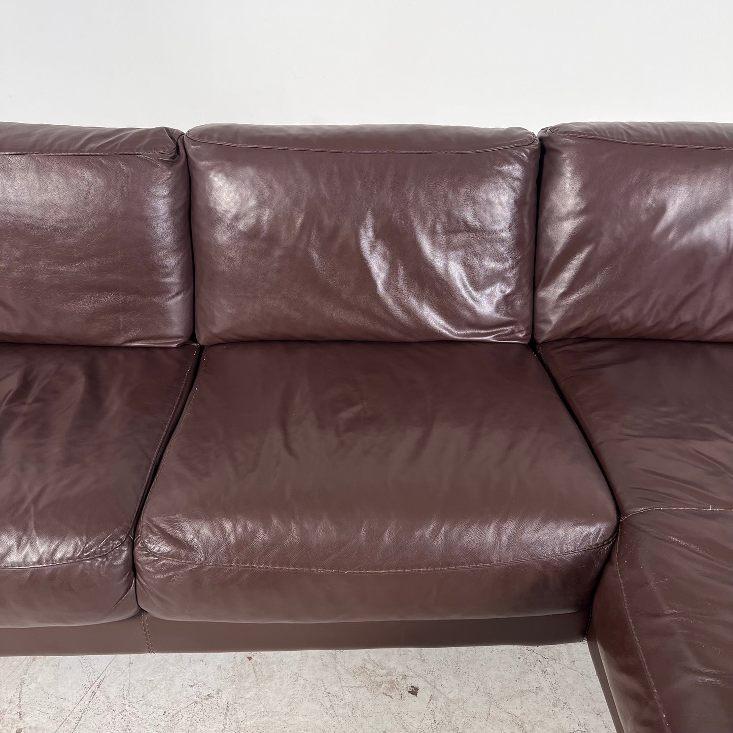 Genuine high end brown leather sectional. L Shaped sofa couch