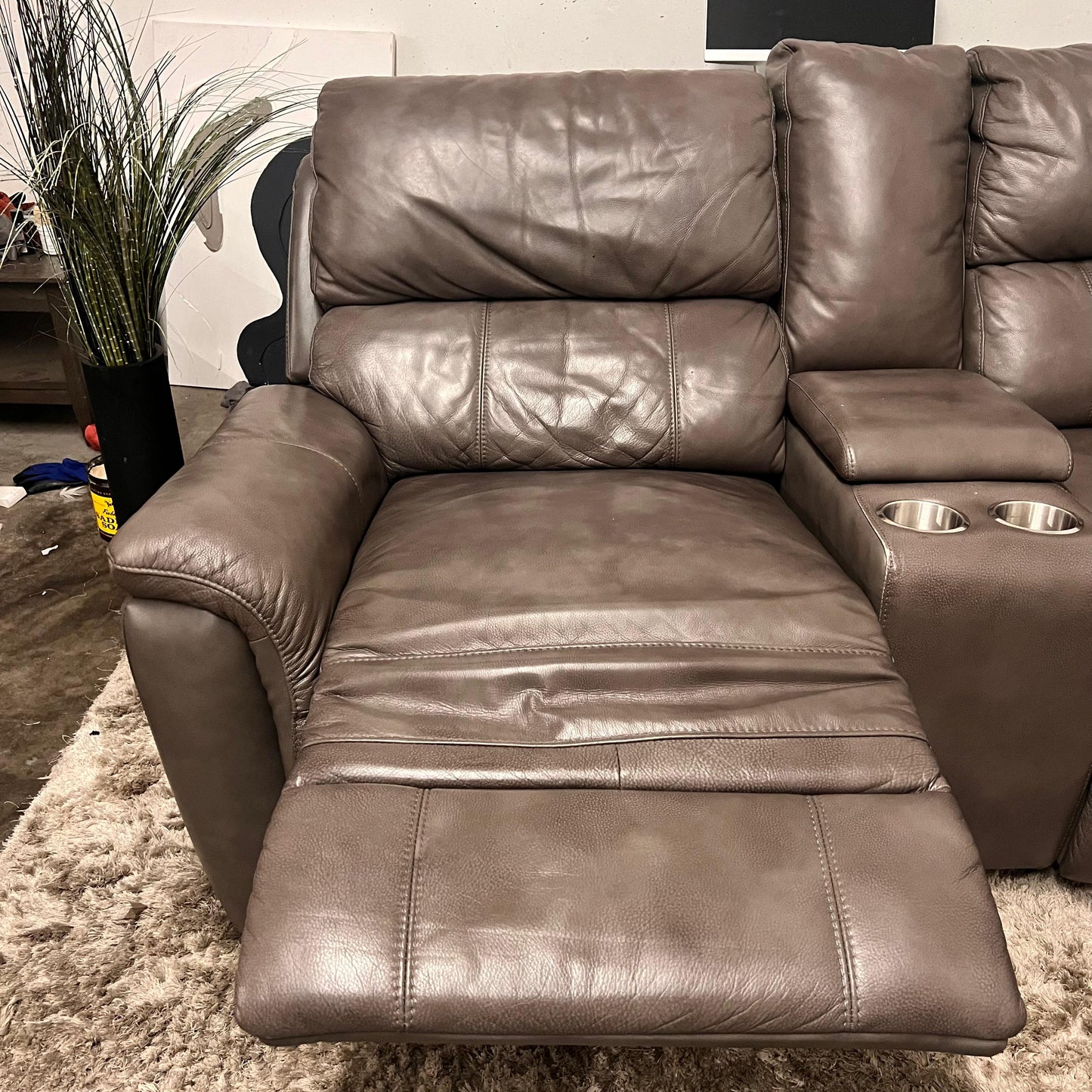 Leather reclining sectional. Power recliners