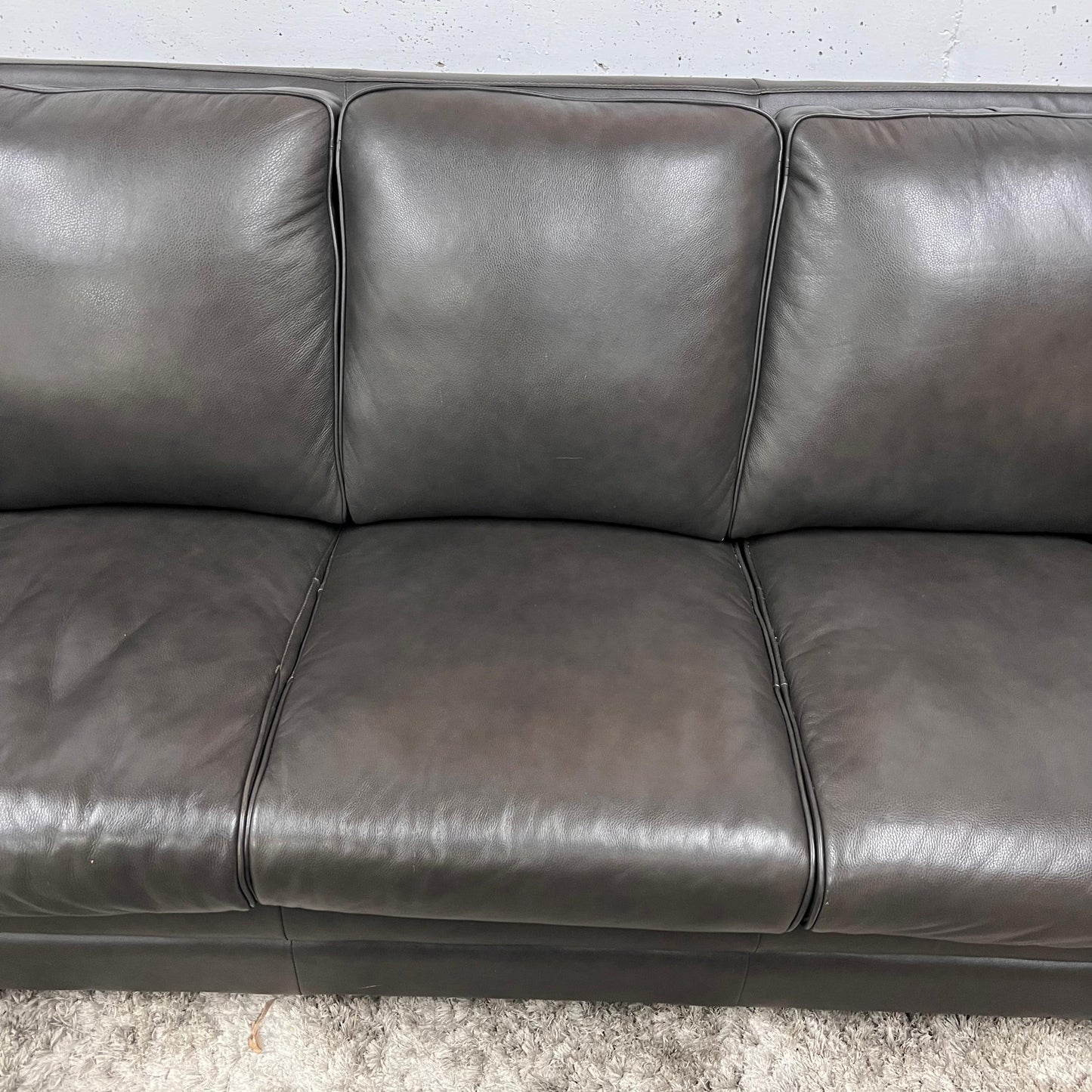 Amax leather sofa and matching ottoman