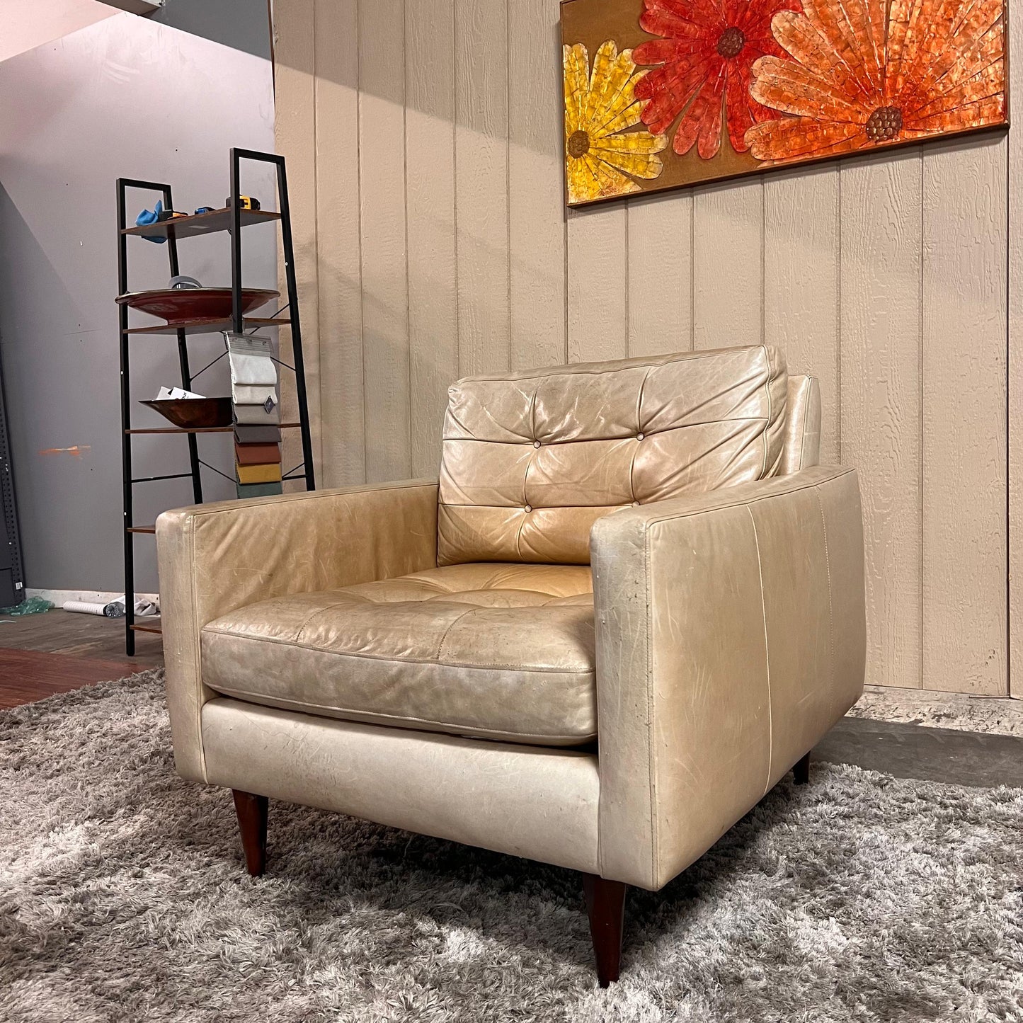 Crate and barrel caramel leather chair.