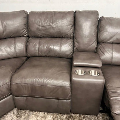 Leather reclining sectional. Power recliners