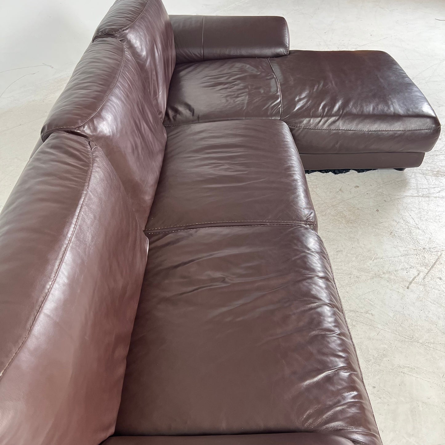 Genuine high end brown leather sectional. L Shaped sofa couch