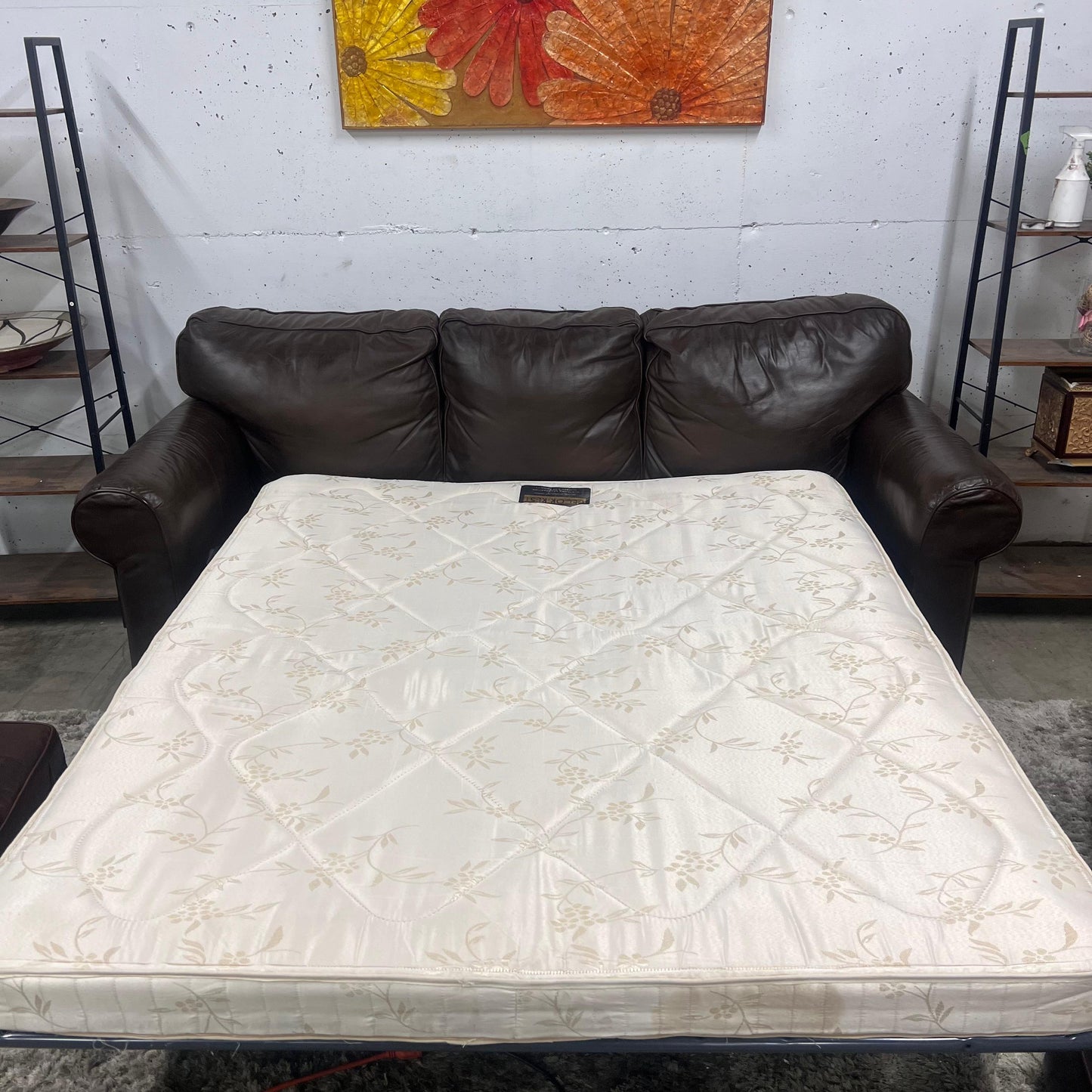 Leather pull out sofa bed.