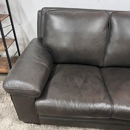 Amax leather sofa and matching ottoman