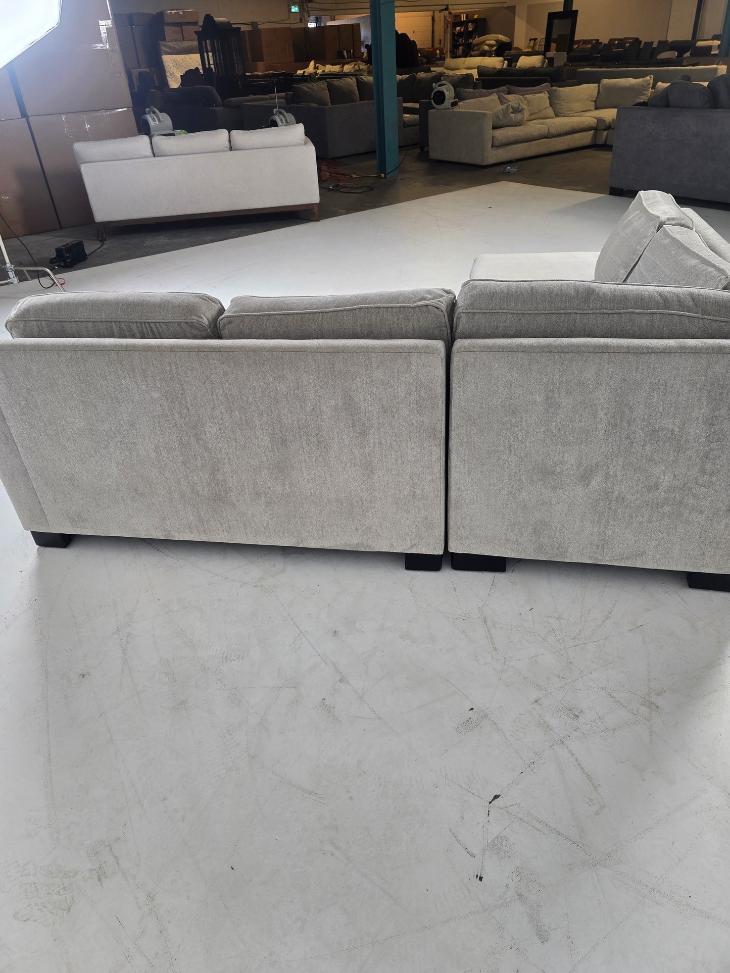 Stylus custom made sectional. Beige L shaped sofa couch.