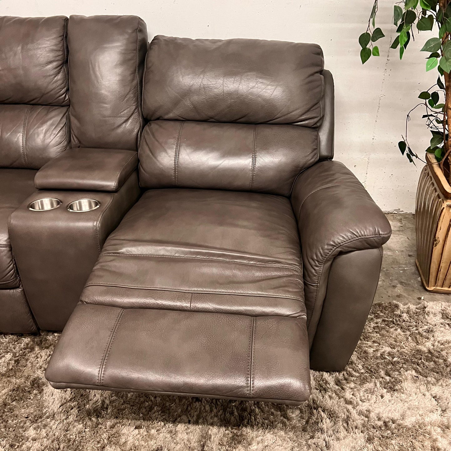 Leather reclining sectional. Power recliners