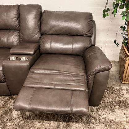 Leather reclining sectional. Power recliners