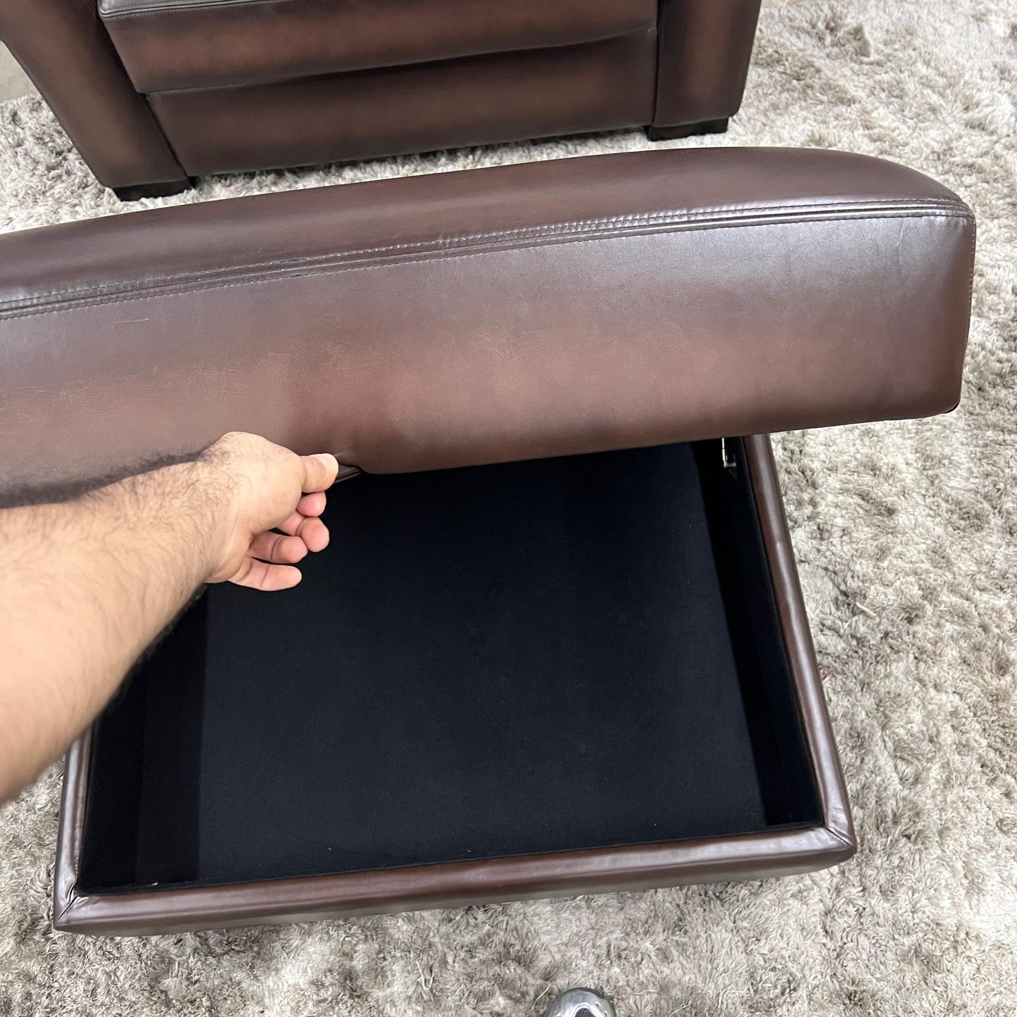 Pottery barn leather chair and a half.