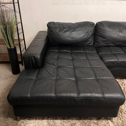 Black leather sectional. L shaped sofa couch.