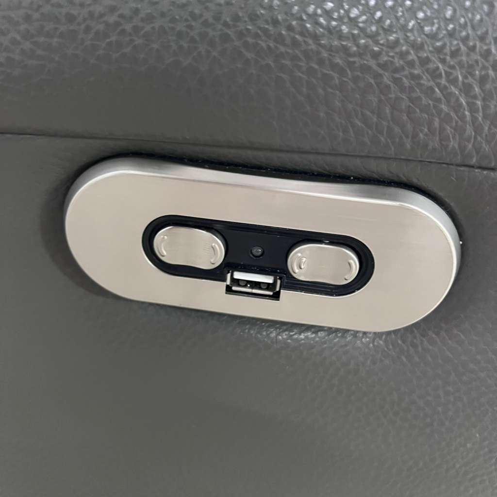 Power leather reclining chair. Real leather armchair.