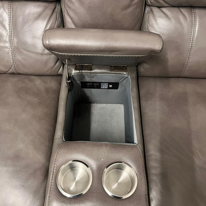 Leather reclining sectional. Power recliners