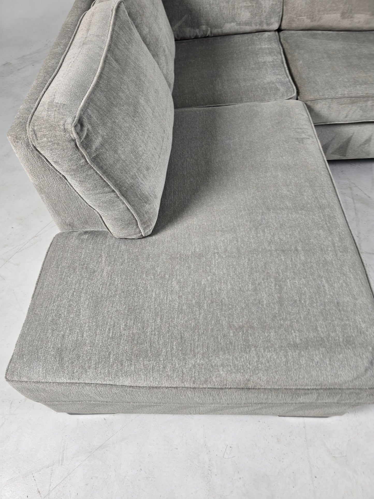 Stylus custom made sectional. Beige L shaped sofa couch.