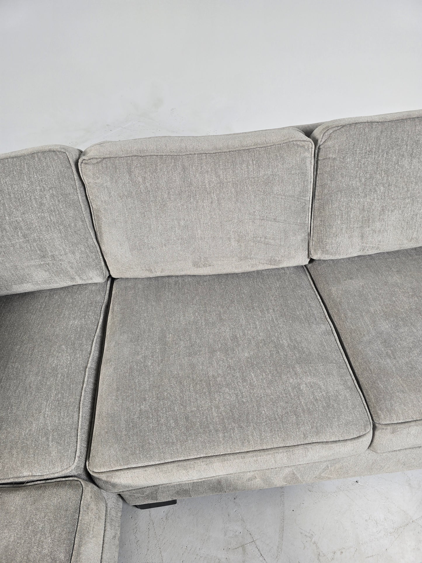 Stylus custom made sectional. Beige L shaped sofa couch.