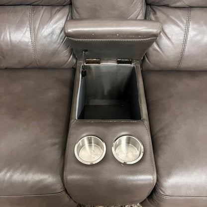 Leather reclining sectional. Power recliners