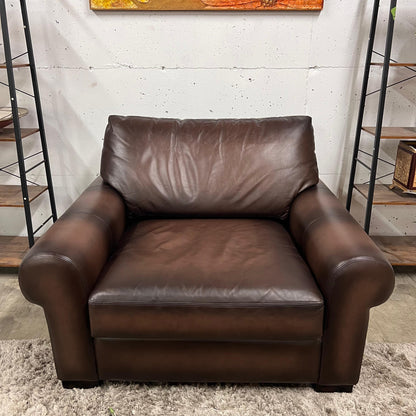 Pottery barn leather chair and a half.