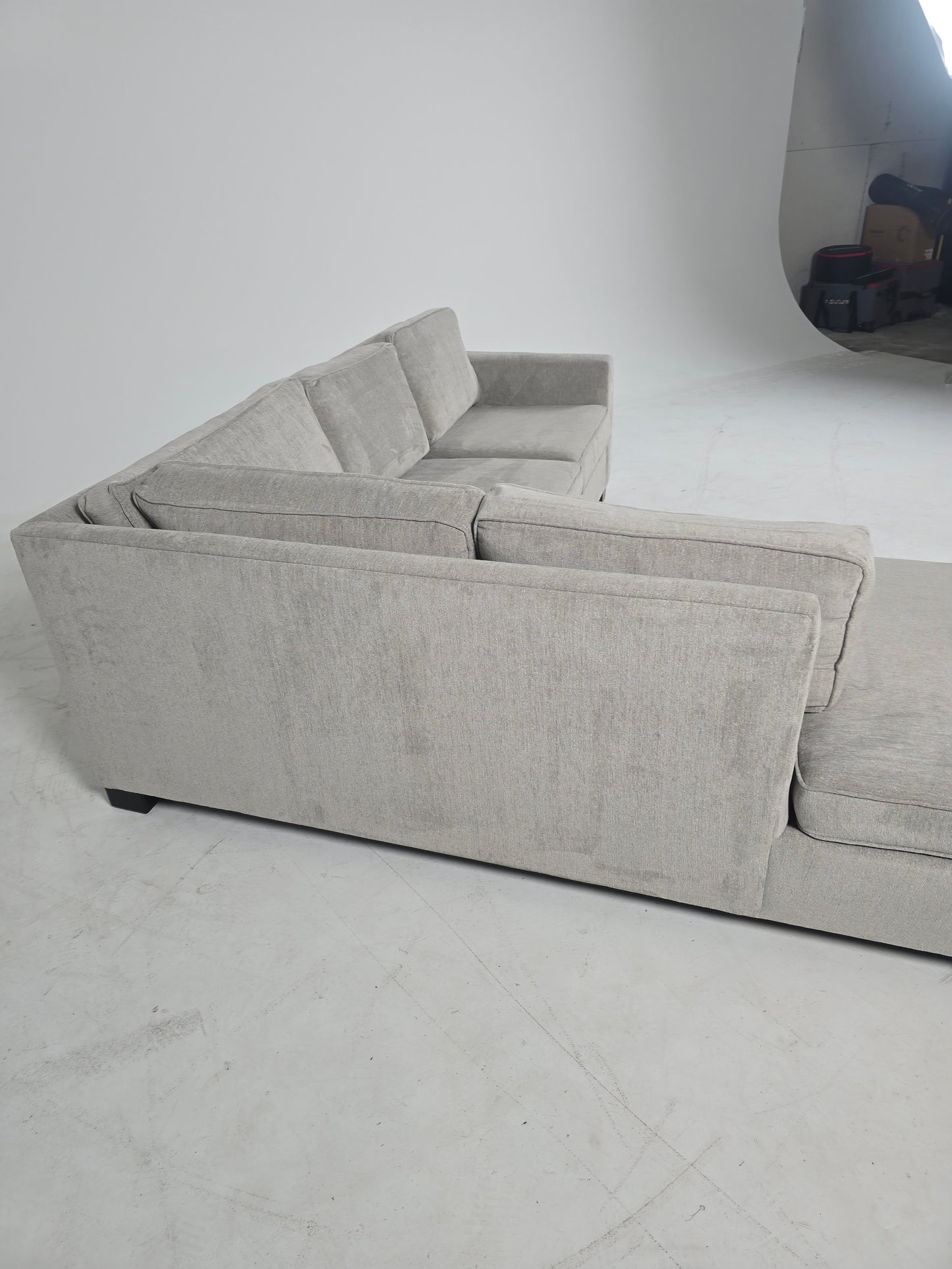 Stylus custom made sectional. Beige L shaped sofa couch.