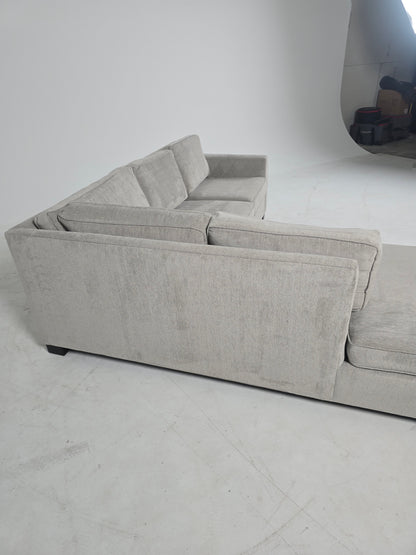 Stylus custom made sectional. Beige L shaped sofa couch.