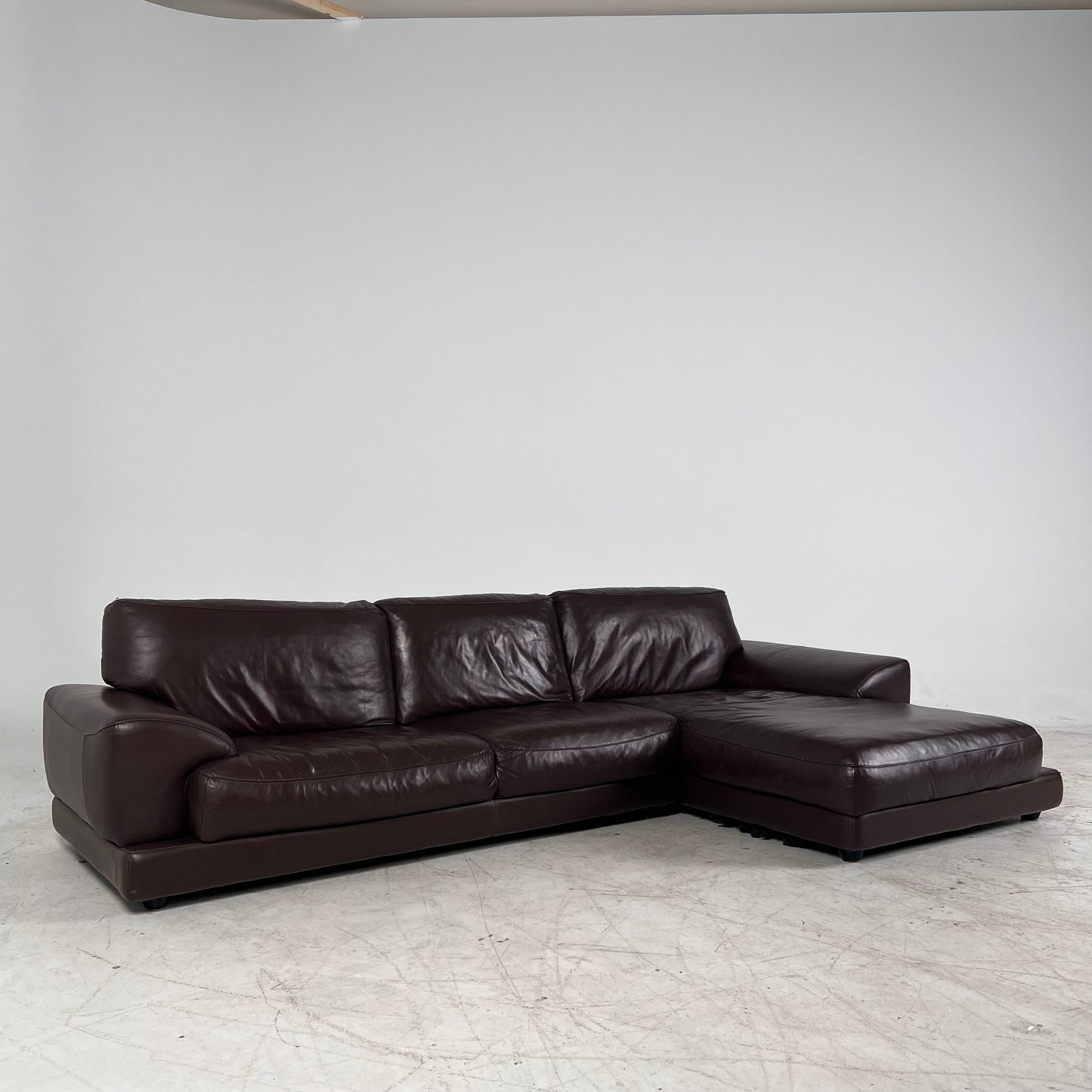 Genuine high end brown leather sectional. L Shaped sofa couch
