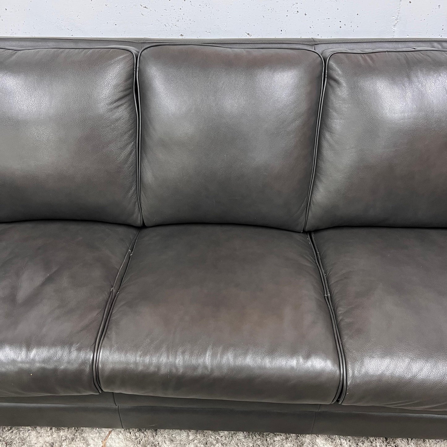 Amax leather sofa and matching ottoman