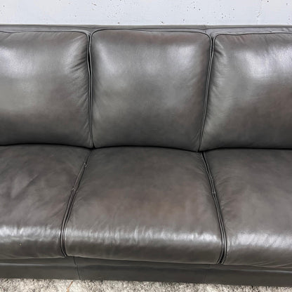 Amax leather sofa and matching ottoman