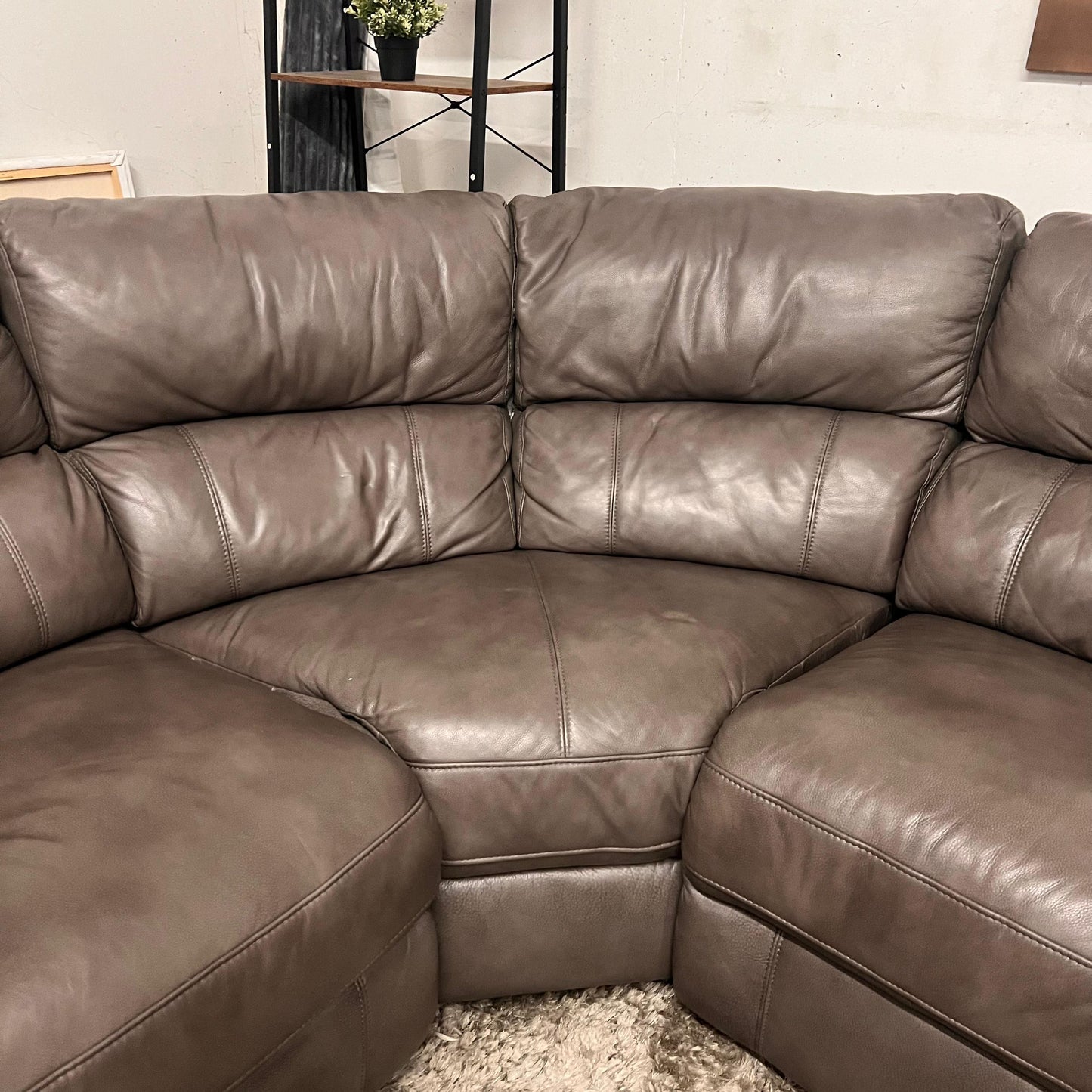 Leather reclining sectional. Power recliners