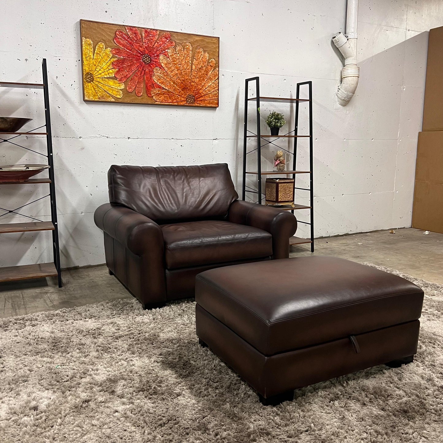 Pottery barn leather chair and a half.