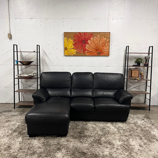 Black leather sectional. L shaped sofa couch. Delivery available