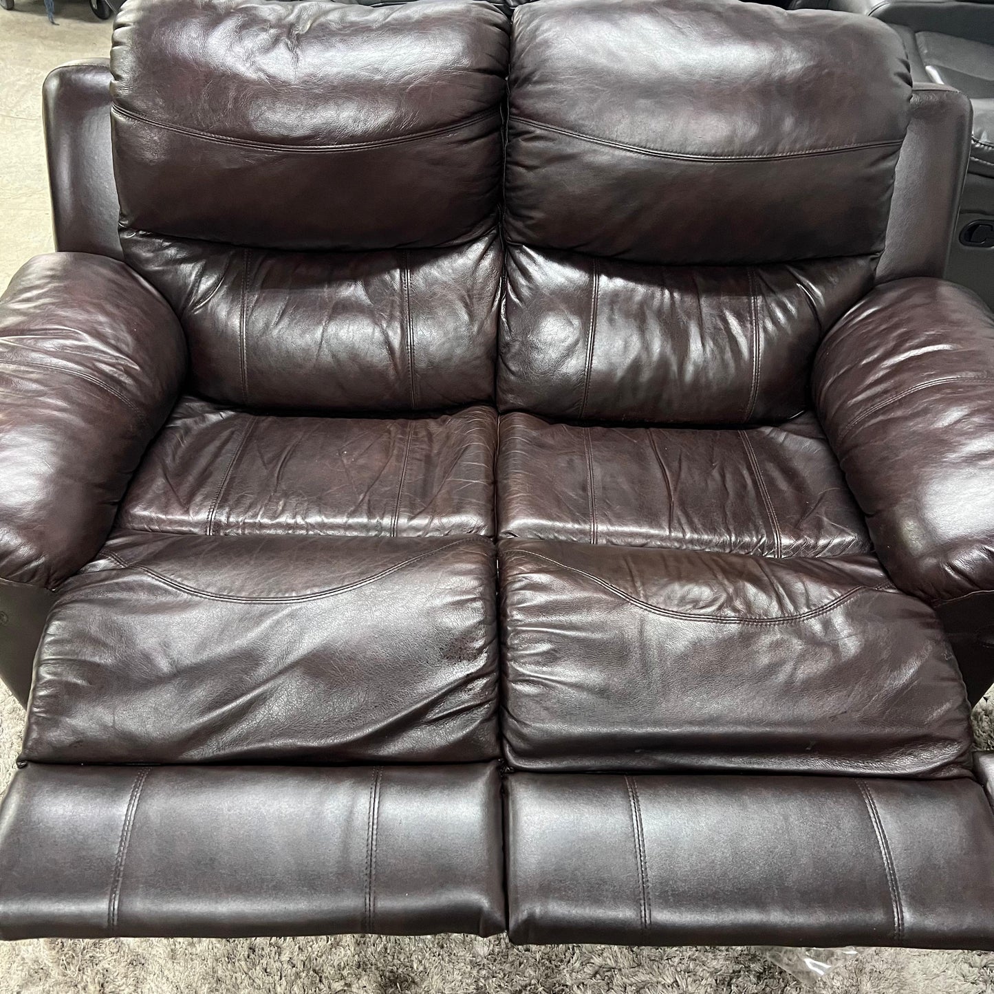 Real leather Reclining sofa set.
