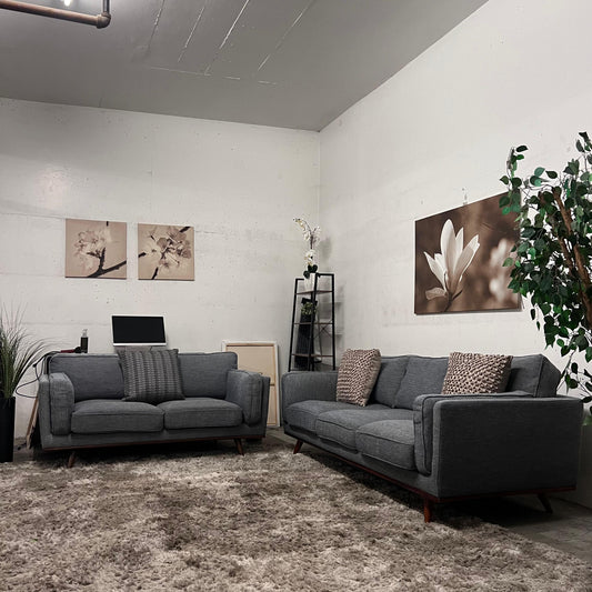 Article style sofa and loveseat set.