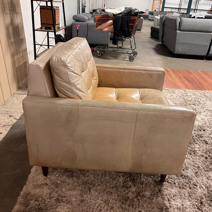 Crate and barrel caramel leather chair.