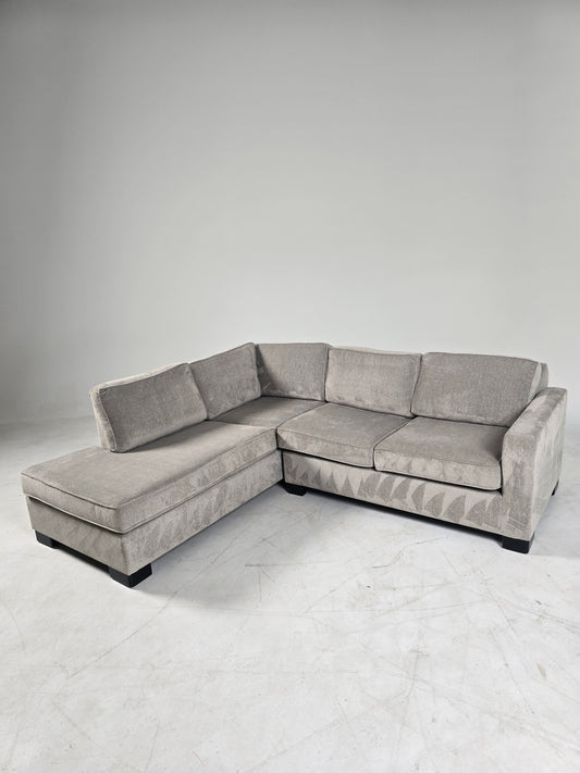 Stylus custom made sectional. Beige L shaped sofa couch.