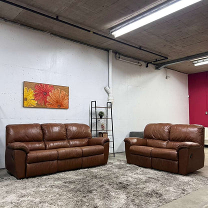 Cognac leather recliner sofa set. Manual reclining couches.