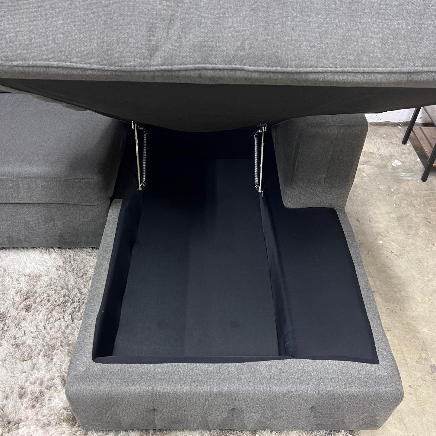 U shaped pull out sectional. Storage sofa couch