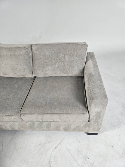 Stylus custom made sectional. Beige L shaped sofa couch.