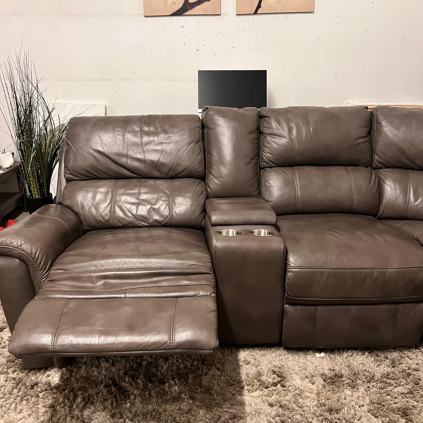 Leather reclining sectional. Power recliners