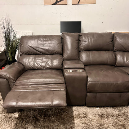 Leather reclining sectional. Power recliners
