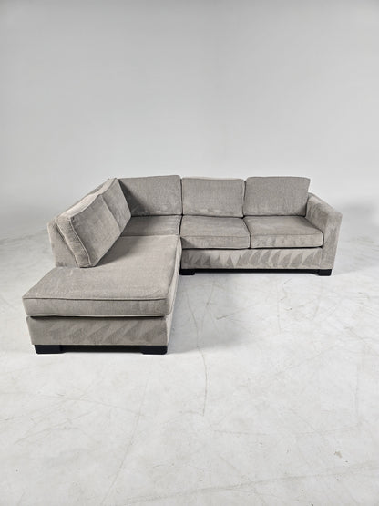 Stylus custom made sectional. Beige L shaped sofa couch.