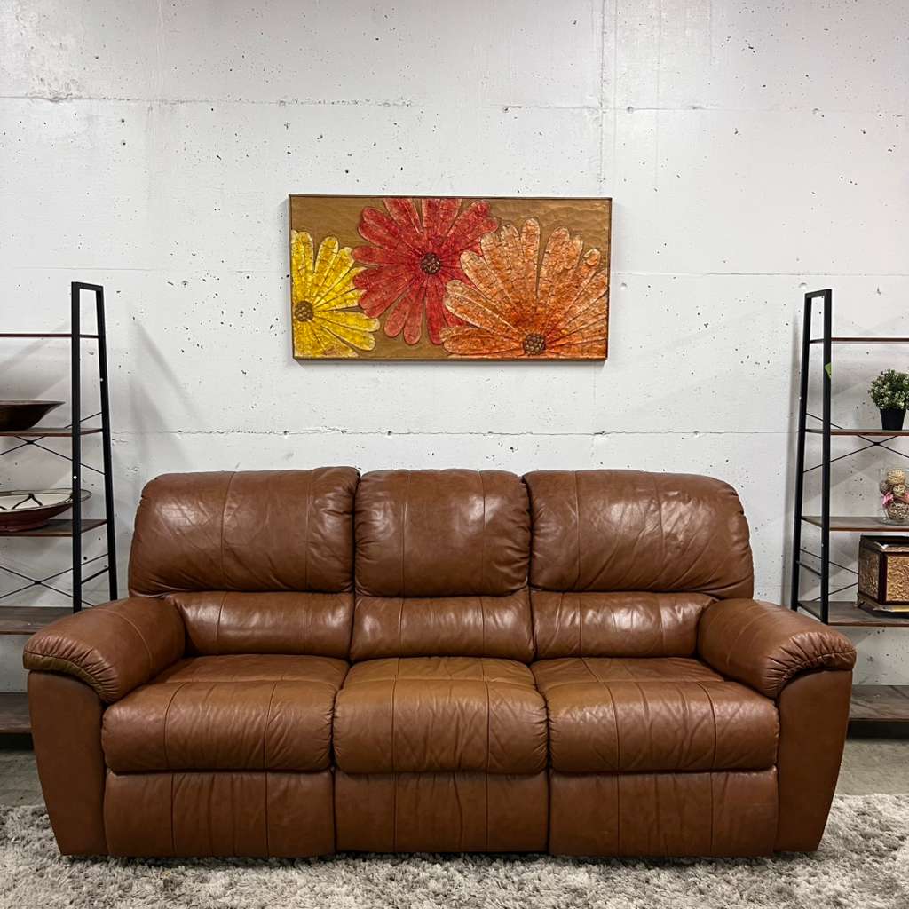 Cognac leather recliner sofa set. Manual reclining couches.