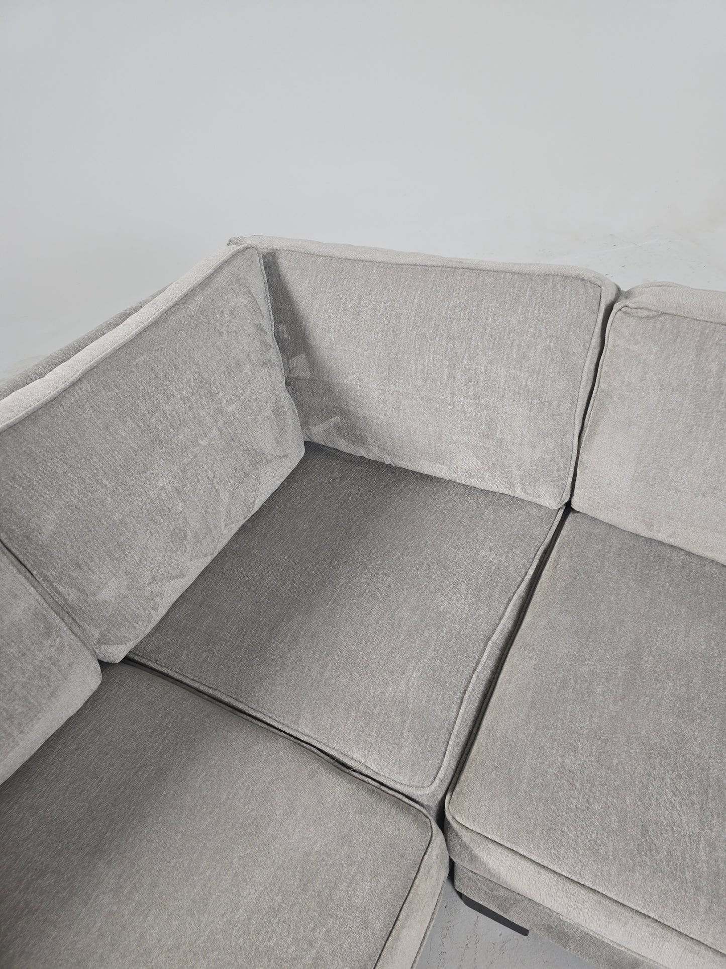 Stylus custom made sectional. Beige L shaped sofa couch.