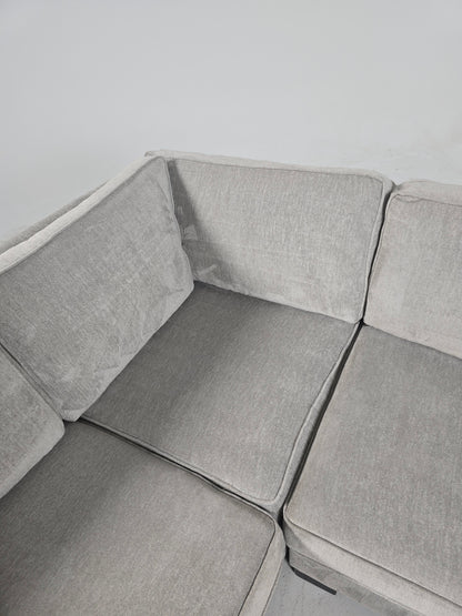 Stylus custom made sectional. Beige L shaped sofa couch.