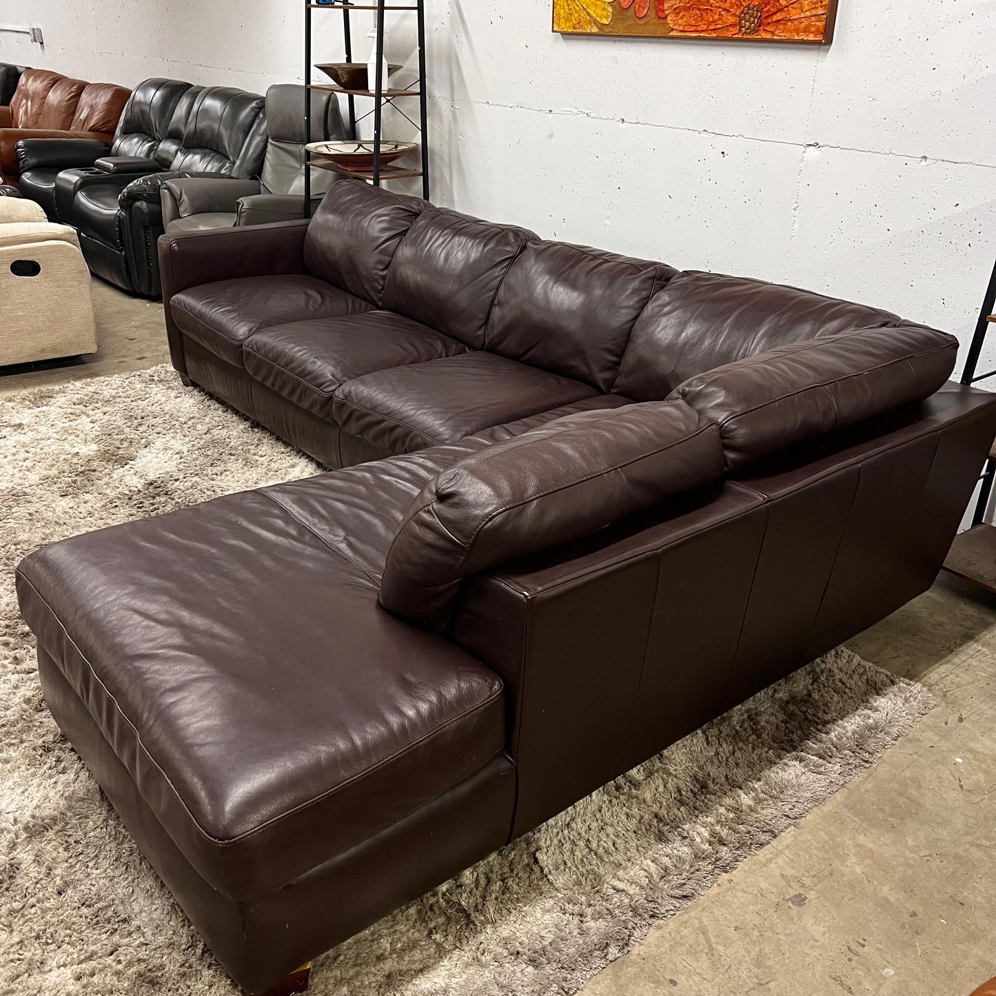 Italsofa Natuzzi leather sectional. L shaped sofa couch.