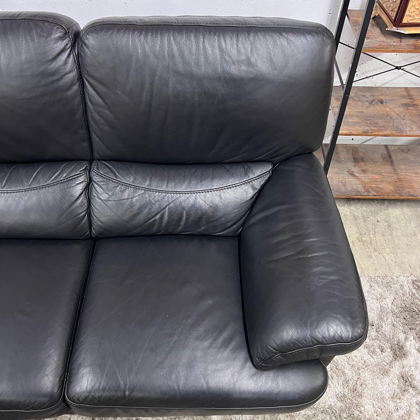 Black leather sectional. L shaped sofa couch. Delivery available